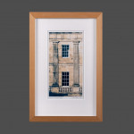 Small, vertical photograph of a bay of Buxton Crescent