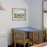 Desk in twin bedroom, with John Stanley watercolour of the Goyt Valley Desk in twin bedroom