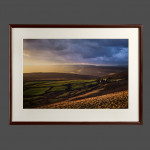 Large landscape photograph with moody sky