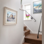 Stairs, with local artwork and good views from the windows Stairs with local artwork