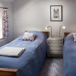 Twin bedroom with Kath Kidston curtains Twin bedroom